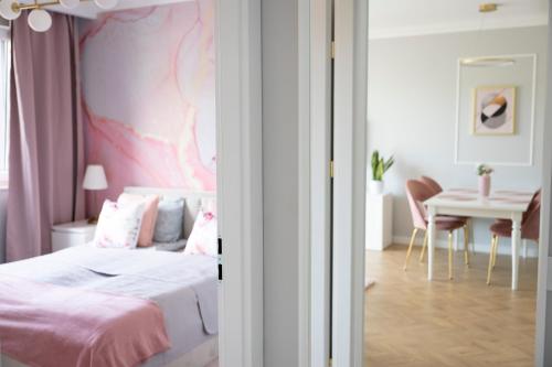 Ένα ή περισσότερα κρεβάτια σε δωμάτιο στο APARTAMENT BOHO