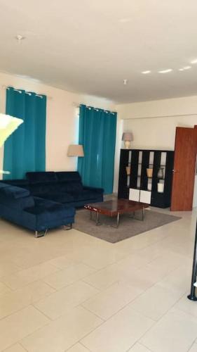 a living room with a couch and a table at Villa between lake and sea in Voroklini