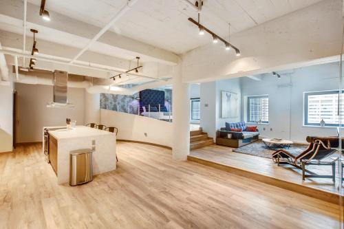 a living room with a table and a couch at Etage Executive Living in Pittsburgh