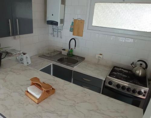 Η κουζίνα ή μικρή κουζίνα στο Condominio Embassy