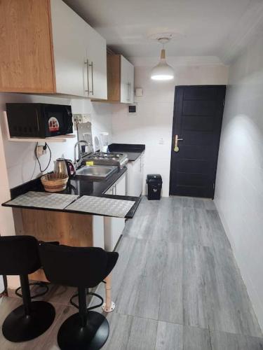 Kuchyň nebo kuchyňský kout v ubytování Studio Américain