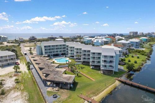 an aerial view of an apartment complex next to the water at Docks 12C in Pensacola