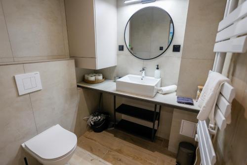 Koupelna v ubytování Gyulai Várpark Apartman