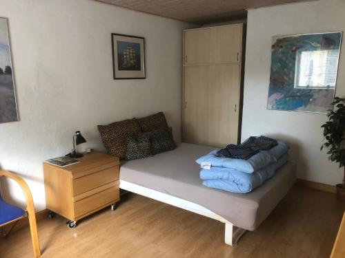 Postel nebo postele na pokoji v ubytování Købmandsgården 1