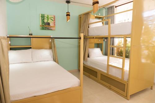 Postel nebo postele na pokoji v ubytování Hostal Las Guaduas