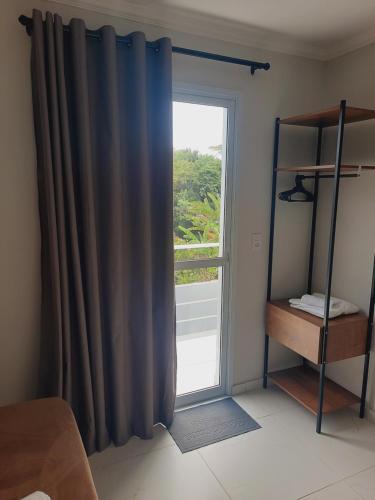 Postel nebo postele na pokoji v ubytování Vila das Cachoeiras