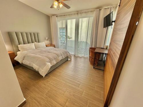 Postel nebo postele na pokoji v ubytování Quinta Los Caballos