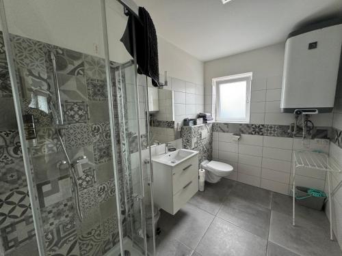 Vannituba majutusasutuses Apartmány Miromar