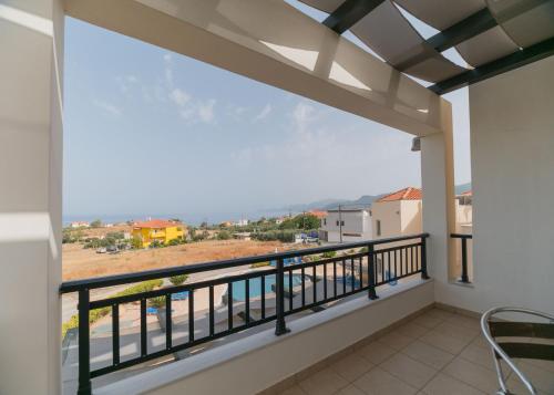 a balcony with a view of the ocean at Apartments Hotel & Studios, Xifoupolis in Monemvasia