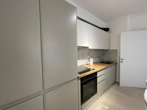 Η κουζίνα ή μικρή κουζίνα στο Modern Seaview Apartments