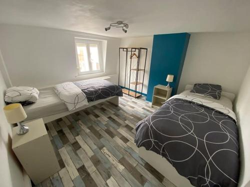 Giường trong phòng chung tại Le Fishermen