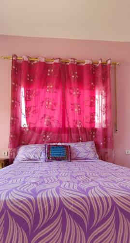 Кровать или кровати в номере Appartements de Vacances Près de la Plage Perle Bleue Saidia