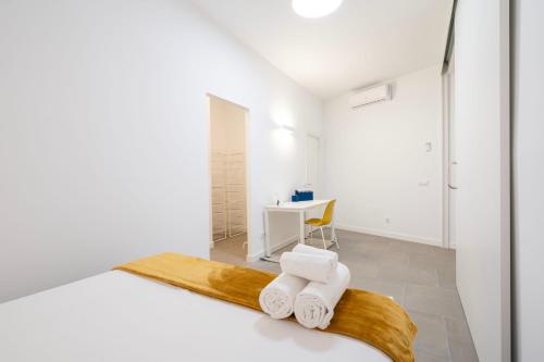 Postel nebo postele na pokoji v ubytování Dobo Madrid Cochabamba