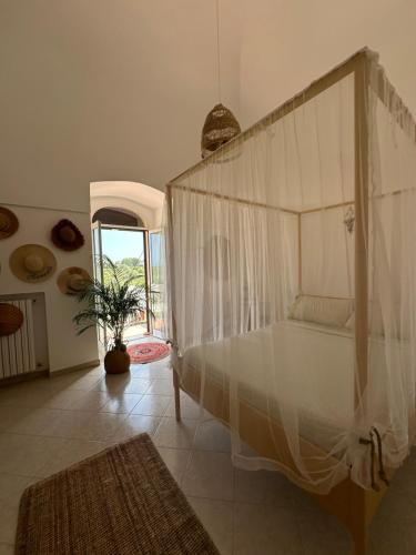 Postel nebo postele na pokoji v ubytování B&B Villa Tiziana