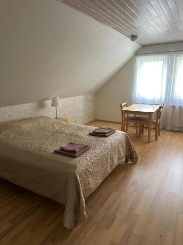 Postel nebo postele na pokoji v ubytování Villa Helena