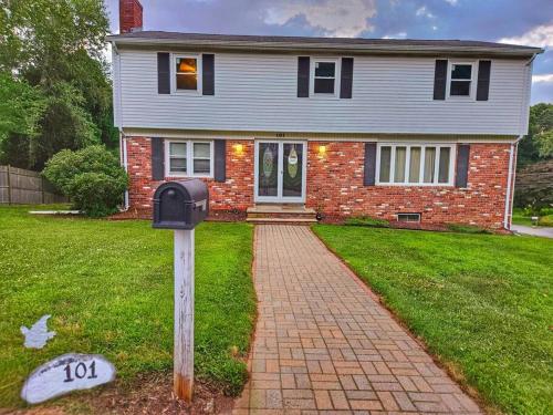 a parking meter in front of a house at Warwick Colonial Retreat in Warwick