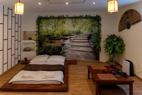 Posteľ alebo postele v izbe v ubytovaní JapanApartment - Jacuzzi