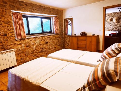 Postel nebo postele na pokoji v ubytování Casa de campo a 10 min. de Santiago