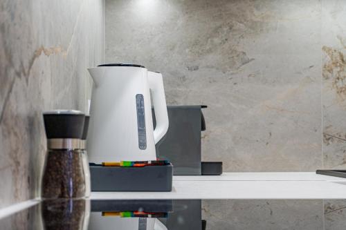 Kuchyň nebo kuchyňský kout v ubytování Apartament Przyjemny, Klimatyzacja, PW INVEST HOME