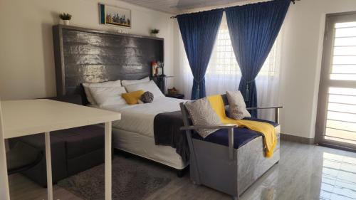 Posezení v ubytování Ticia Apartment, Chipata