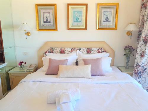 Una cama o camas en una habitación de Plaza la marsa