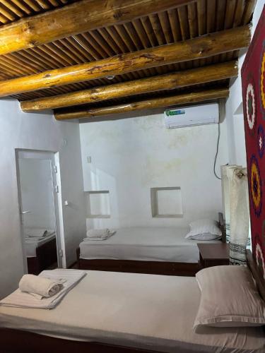 Letto o letti in una camera di Ohun karavan saray historical 18th century hotel
