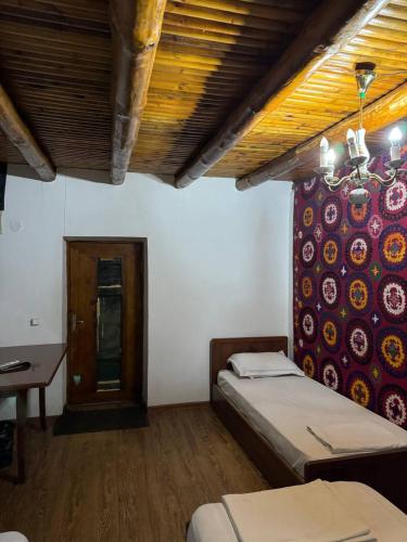 Letto o letti in una camera di Ohun karavan saray historical 18th century hotel