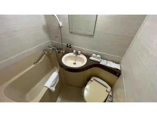 a small bathroom with a sink and a toilet at Fuji Park Hotel - Vacation STAY 23854v in Fuji