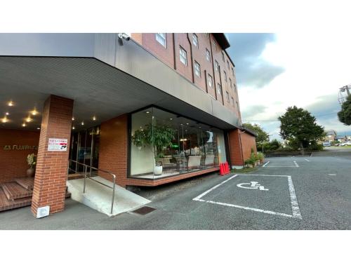 an empty parking lot in front of a building at Fuji Park Hotel - Vacation STAY 23861v in Fuji