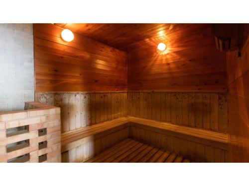 a wooden sauna with two lights on top of it at Goto Conkana Kingdom - Vacation STAY 29692v in Goto