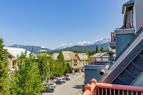 a view of a town with cars parked on a street at Alpenglow Lodge by Elevate Vacations in Whistler