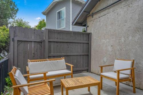 two chairs and a table on a patio at Elm Mountain View Fire pit, quiet and more in Los Angeles
