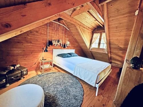 Postel nebo postele na pokoji v ubytování Woodhouse Xirolivado