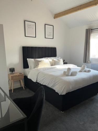 Ένα ή περισσότερα κρεβάτια σε δωμάτιο στο 3 Bed Barn in Cambridge next to Anglesey Abbey