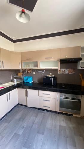 Kuchyň nebo kuchyňský kout v ubytování Zaki