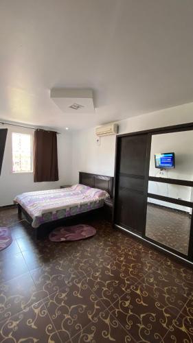 Postel nebo postele na pokoji v ubytování Zaki