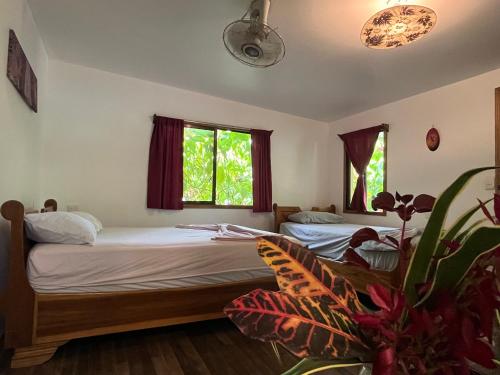 Postel nebo postele na pokoji v ubytování La Ruka Hostel