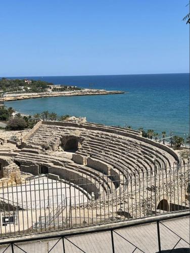 a large amphitheater with the ocean in the background at Quiet Salou Beach Front in Salou