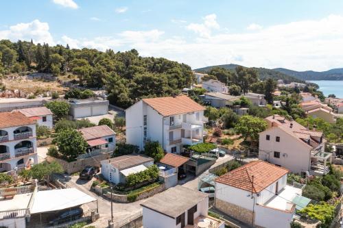 an aerial view of a small town with houses at Apartment Tisno 4295d in Tisno