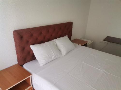 Katil atau katil-katil dalam bilik di Egnatia En Suites