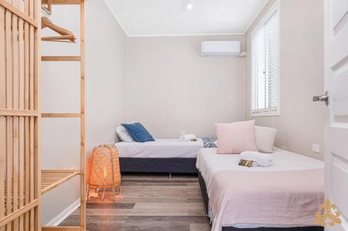 Ένα ή περισσότερα κρεβάτια σε δωμάτιο στο Oasis Two On Farnborough