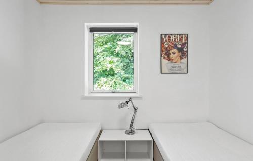 Beautiful Home In Tranekær With Wifiにあるベッド