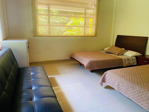 Cama o camas de una habitación en Casa Quinta privada con piscina soleada Billar, Tejo, Jacuzzy climatizado, kiosco