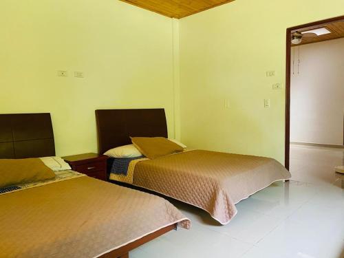 Cama o camas de una habitación en Casa Quinta privada con piscina soleada Billar, Tejo, Jacuzzy climatizado, kiosco