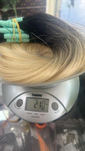 a scale with a bunch of hair on top of it at Studio Eli lima in Garanhuns