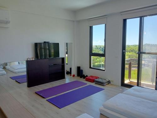 Una cama o camas en una habitación de 宜蘭頭城多一點民宿