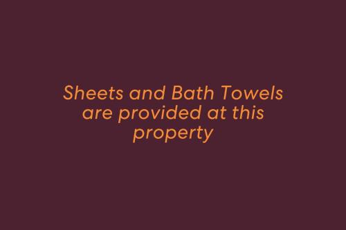 checks and bath towels are provided at this property purple at Oaks Pacific Blue 349 fantastic pool in Salamander Bay