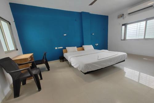 Katil atau katil-katil dalam bilik di Hotel Sai Inn Executive