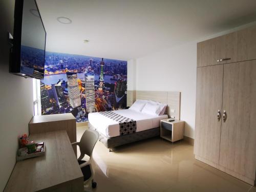 TV a/nebo společenská místnost v ubytování Hotel Lleras Express
