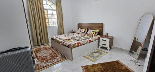 Llit o llits en una habitació de Omar's apartment